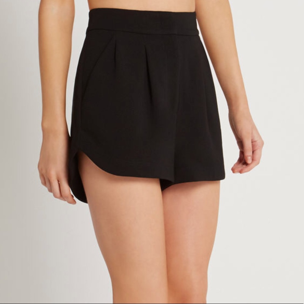 BCBGeneration Curved Hem Pleated Shorts